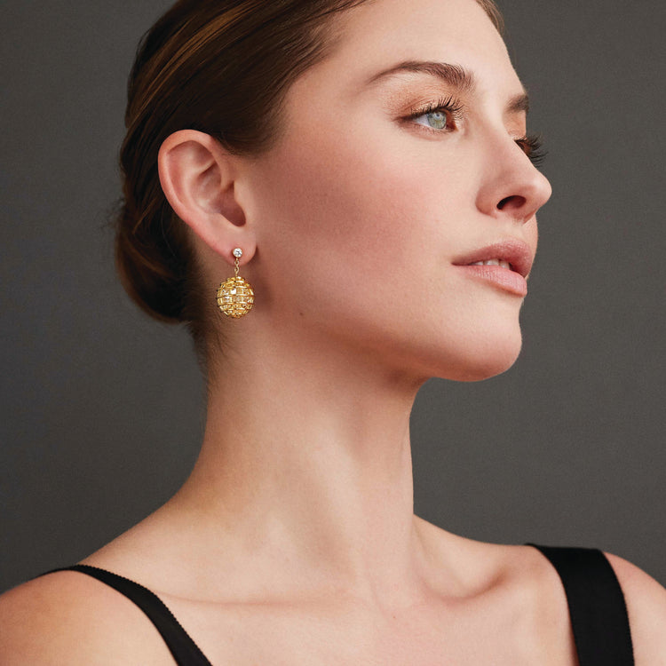 Model wearing Caged Drop Earclips