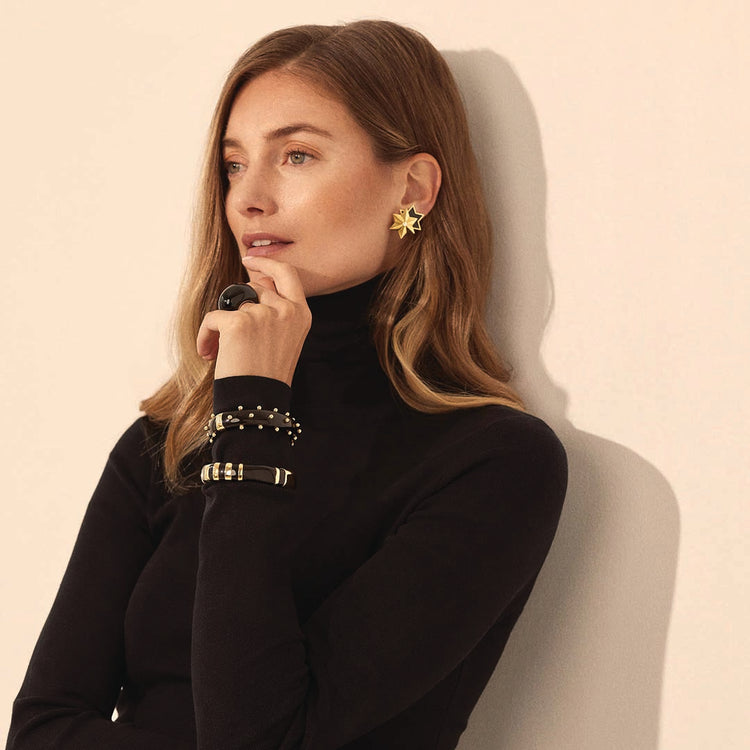 Model wearing Sicily Bangles and Star earclips