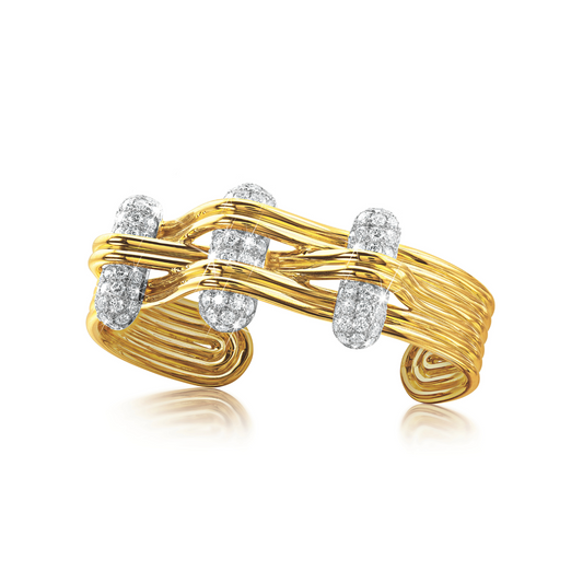 Verdura Trio Bangle in gold with platinum and diamond accents, adapted from a 1940 archival ring design