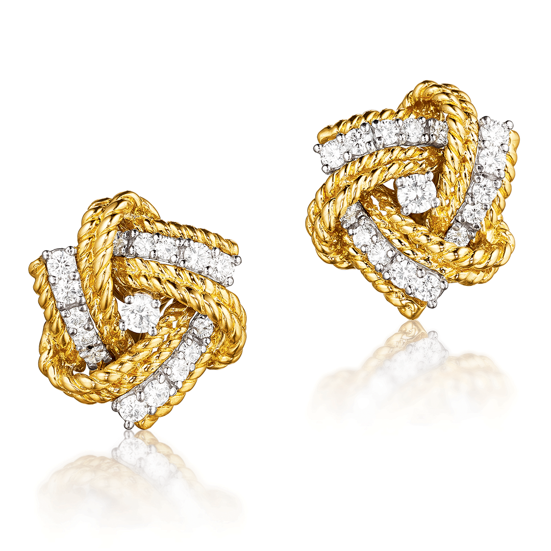 Pinwheel earclips in gold and diamond